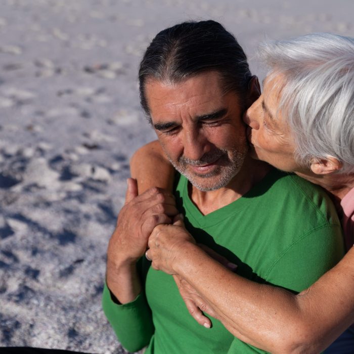 senior-caucasian-couple-enjoying-time-at-the-beach-2021-08-28-16-52-03-utc