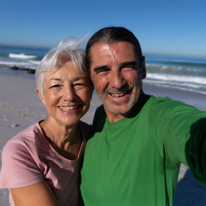 senior-caucasian-couple-enjoying-time-at-the-beach-2021-08-28-16-52-05-utc (1)