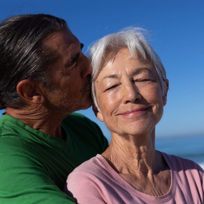 senior-caucasian-couple-enjoying-time-at-the-beach-2021-08-28-16-52-05-utc